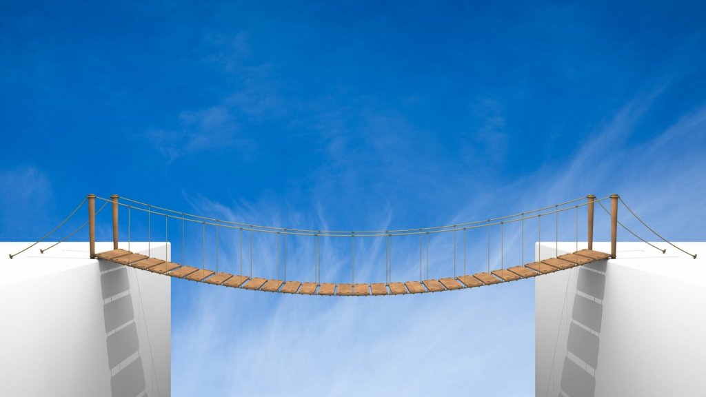 a wooden bridge over symbolizing the connection between business units and IT